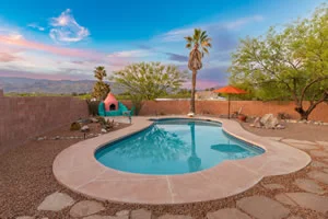 Luxury Home Pool At Sunset